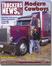 Earl and Debbie Peterson and Peterbilt 379 showtruck, Kersplat, on cover of January 2000 issue of TRUCKERS NEWS!